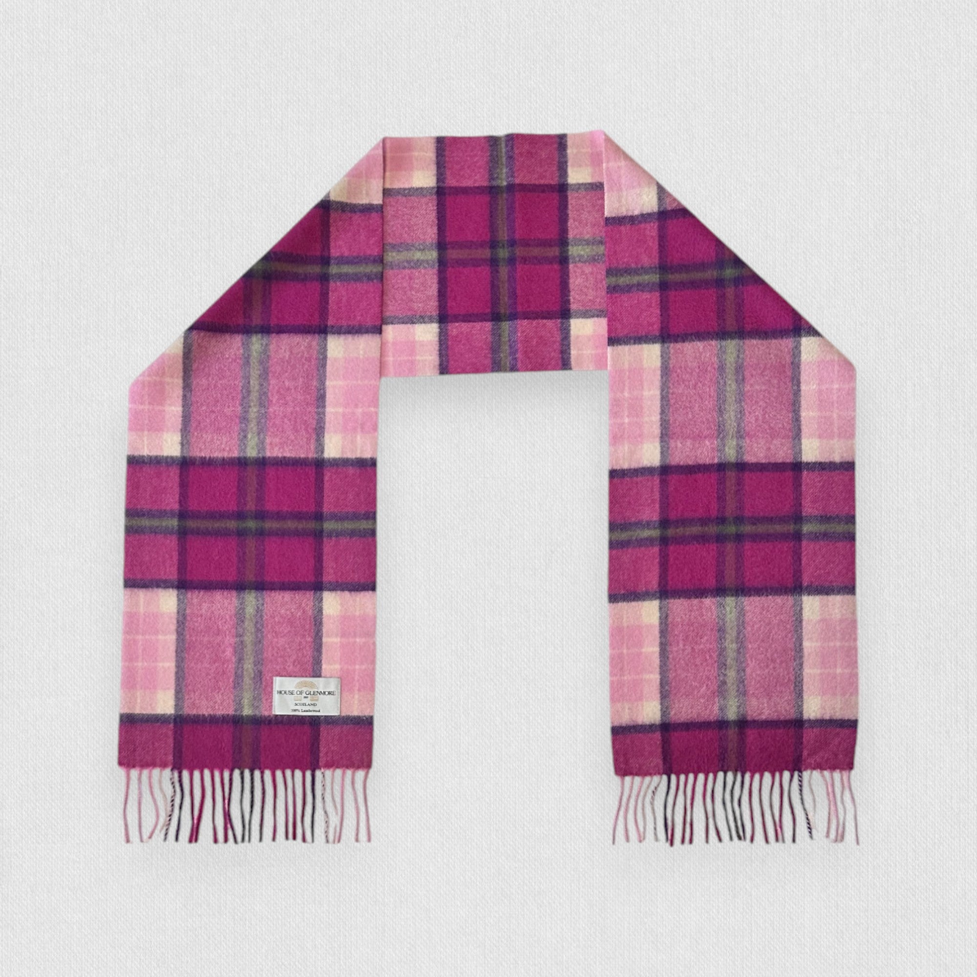 Pink and purple plaid scarf on a white background