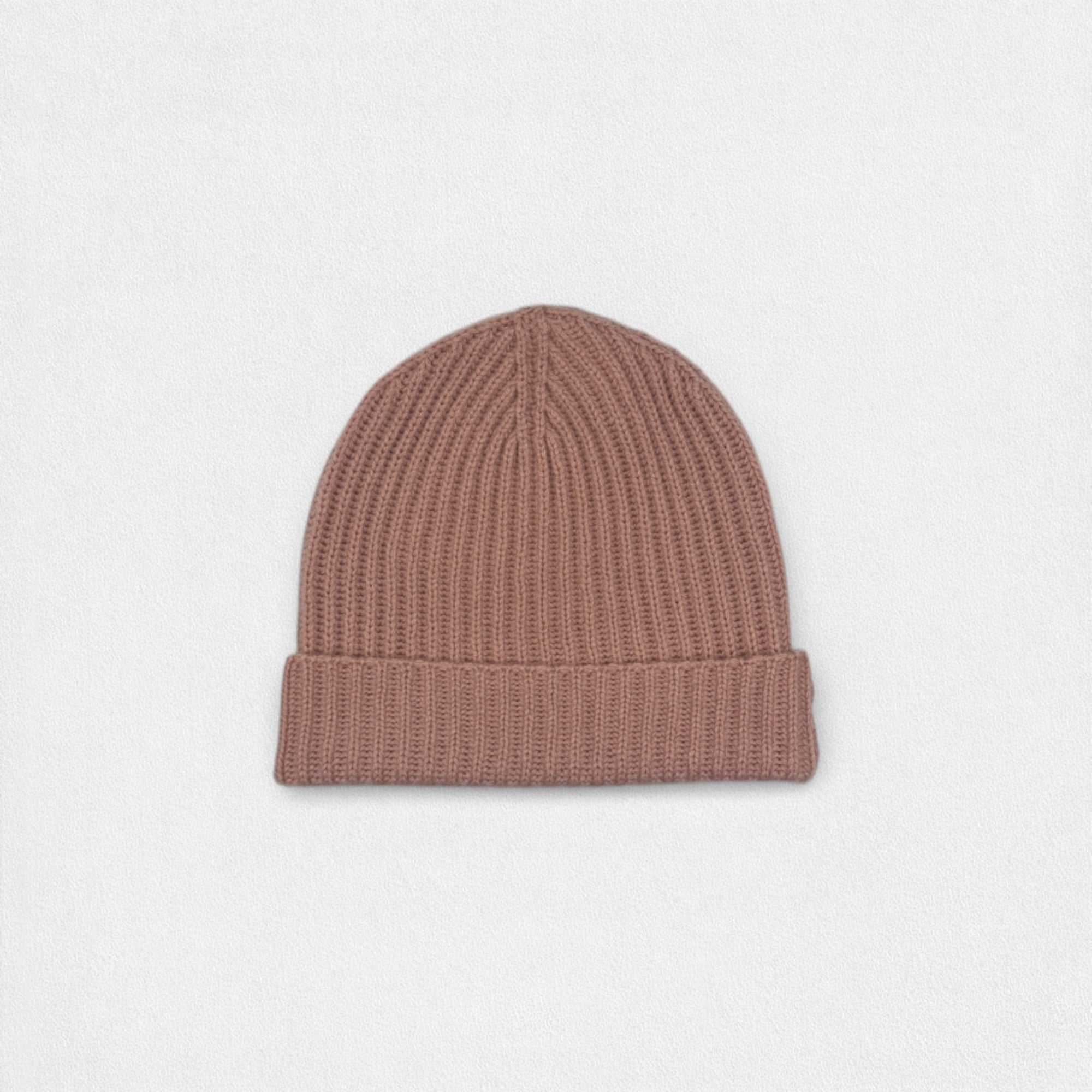 Brown knit beanie on a light gray background