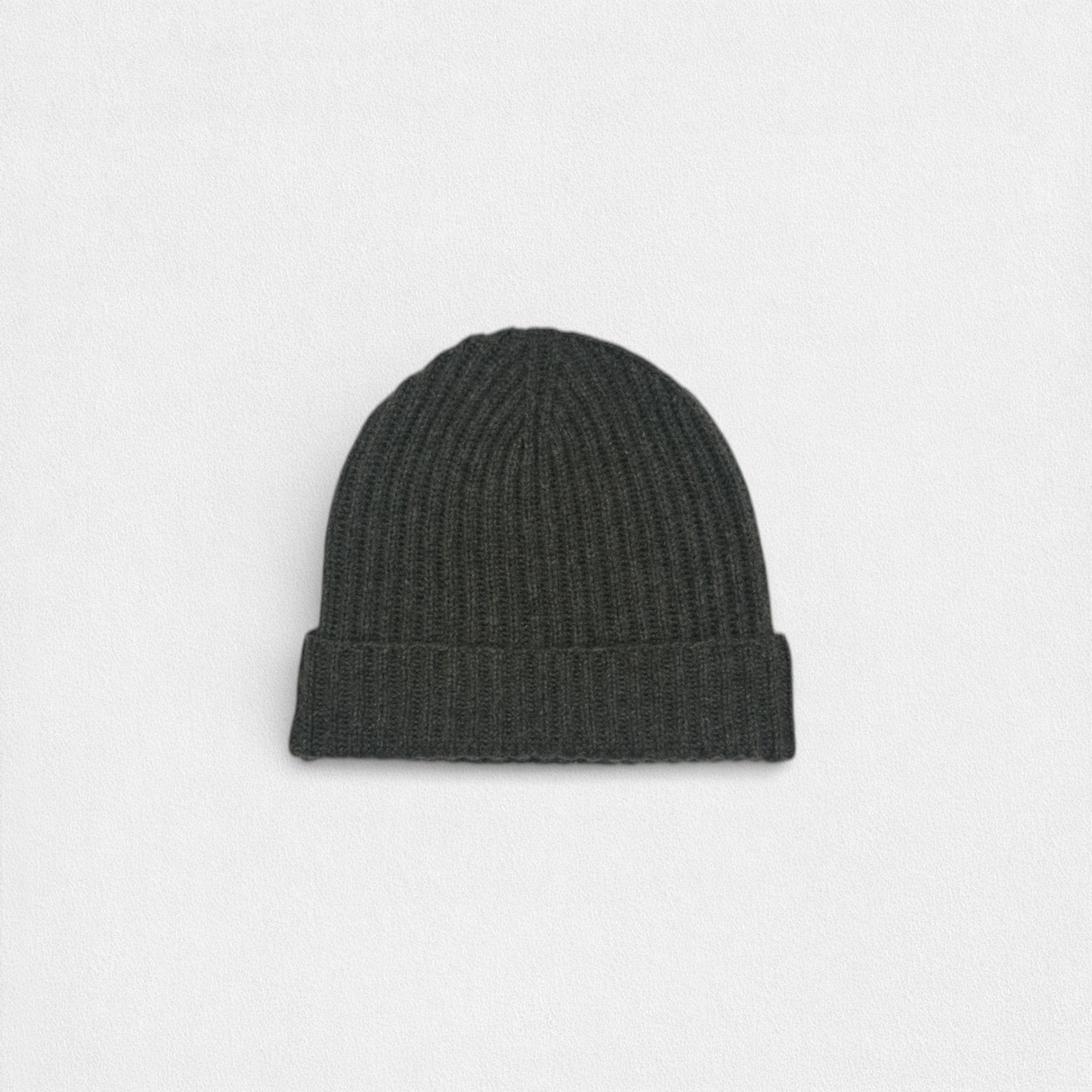 Dark olive cashmere beanie on a white background.