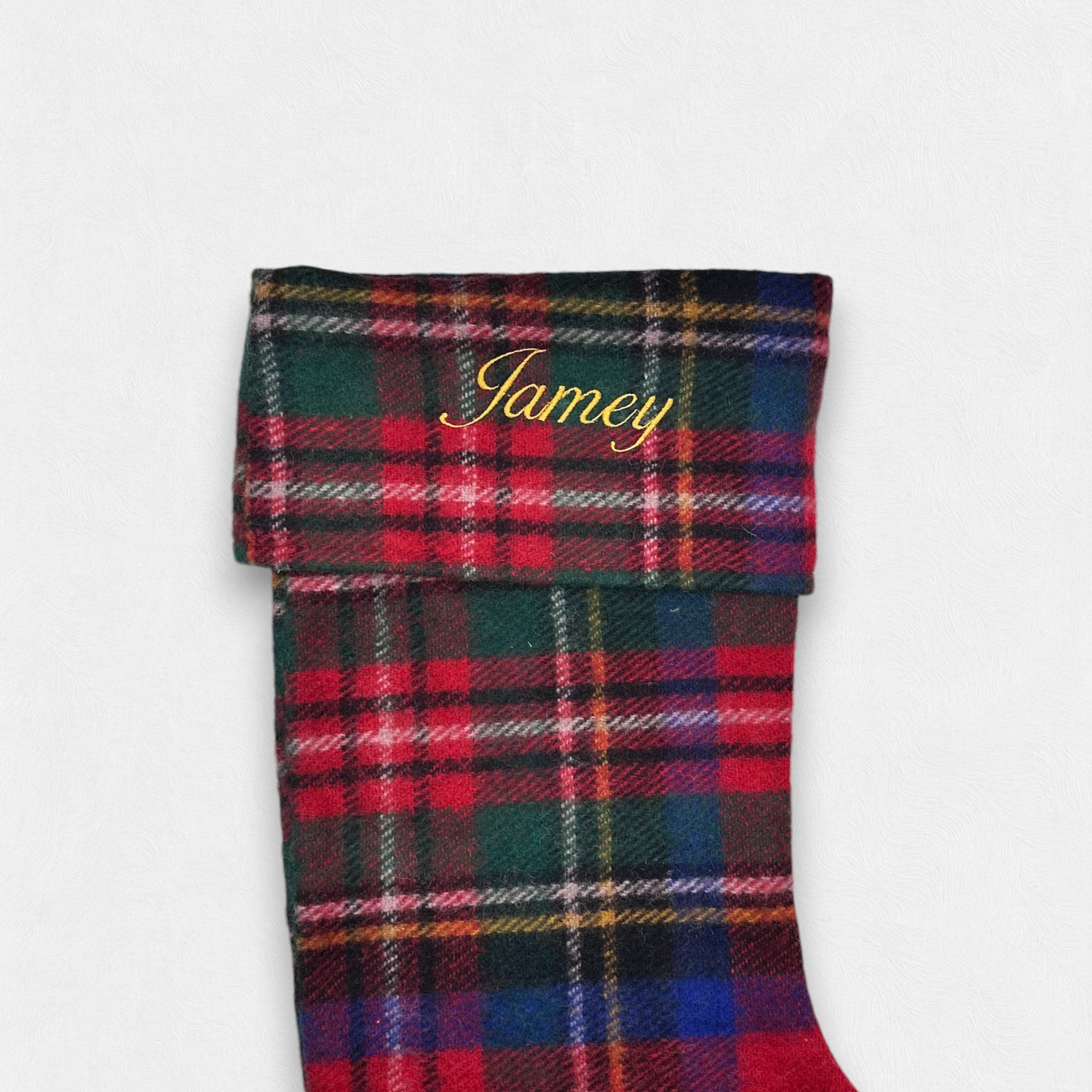 The Ballantines script font embroidered onto the Royal Stewart Christmas stocking.