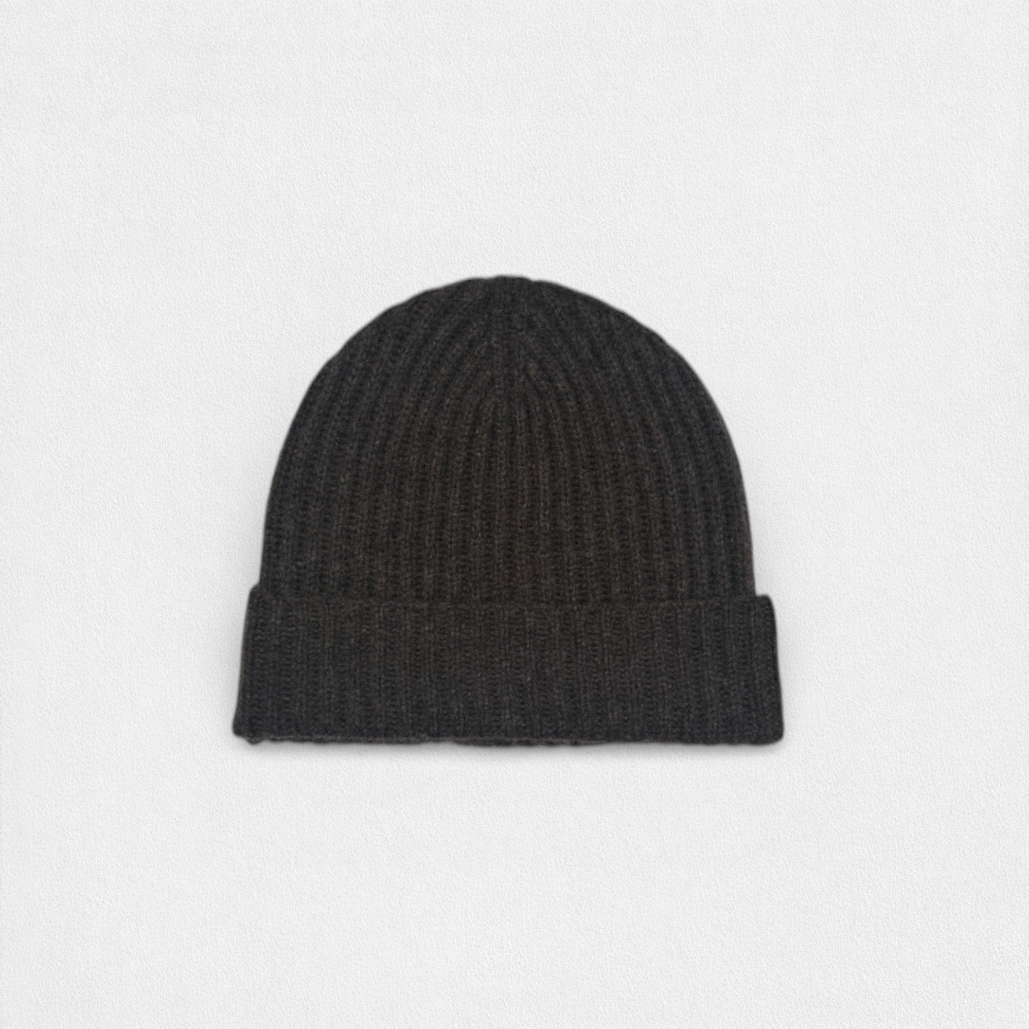Deep dark brown ribbed cashmere beanie on a white background.
