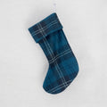 A blue and green plaid called Ramsay tartan Christmas stocking hanging against a white background.