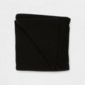 A folded black cashmere blanket displayed on a white background.